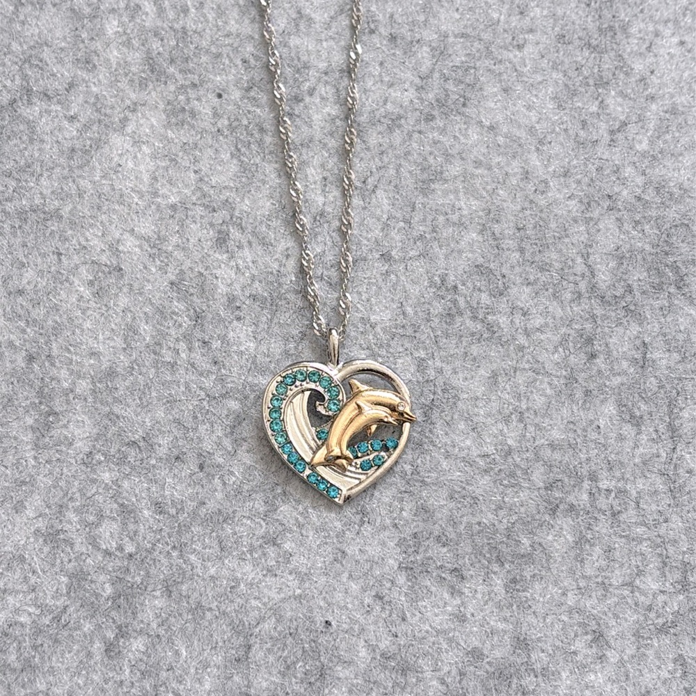 Silver Dolphin Necklacee in a Heart